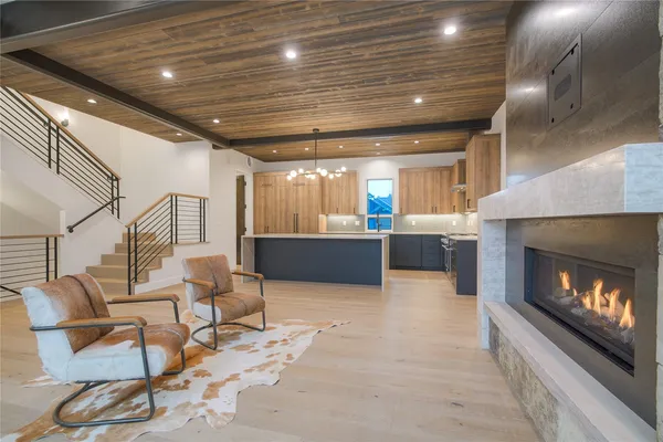 a living room with a fireplace furniture and a fireplace