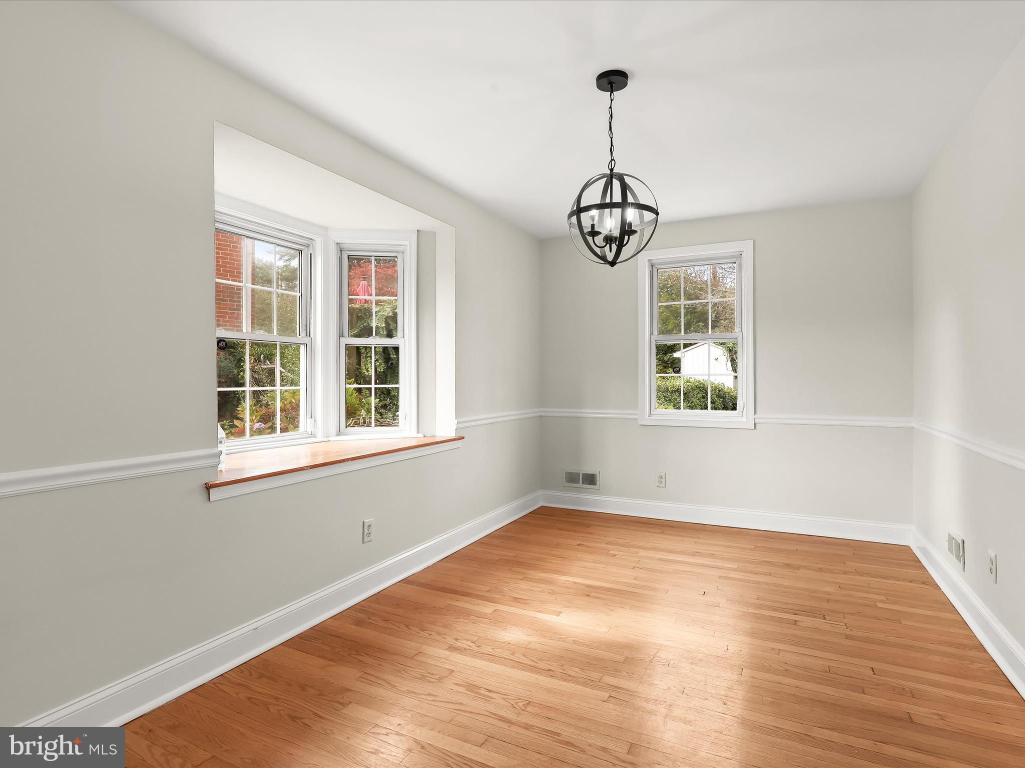 8328 Wyton Road Towson, MD 21286 - Photo 9 of 36 a view of empty room with wooden floor and fan