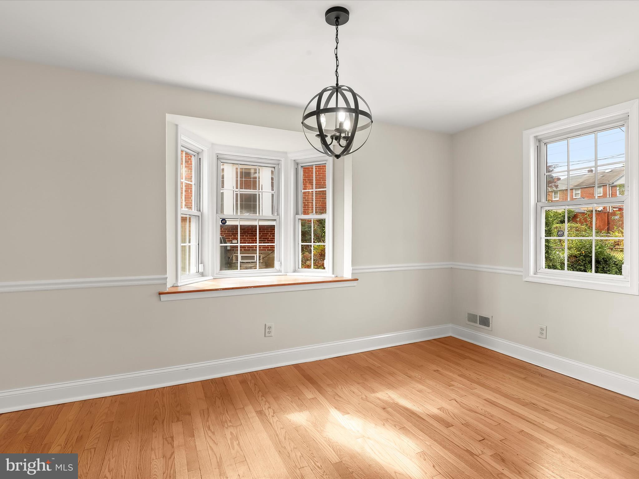 8328 Wyton Road Towson, MD 21286 - Photo 10 of 36 a view of empty room with wooden floor and fan