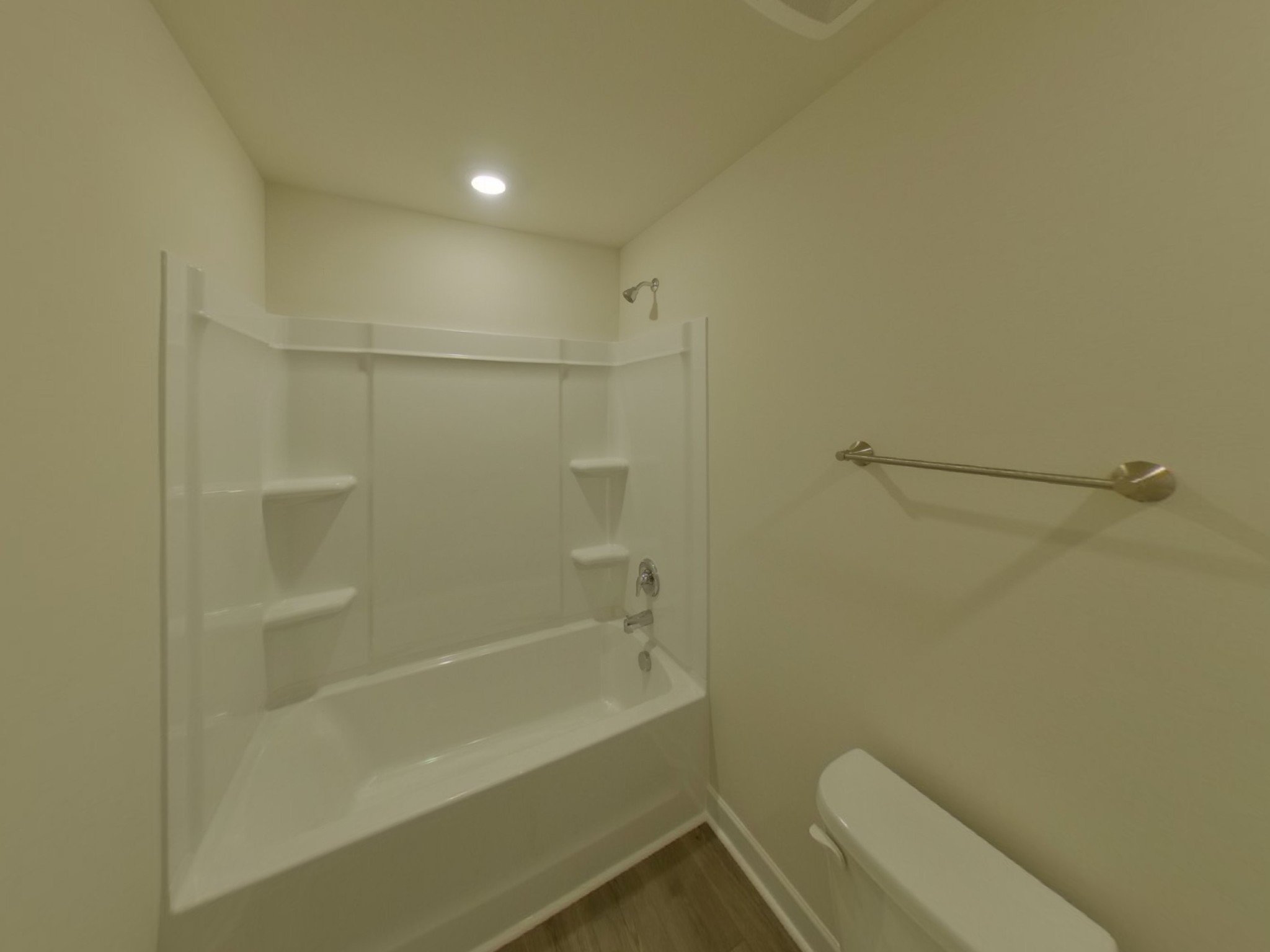 2410 Valverde Way Murfreesboro, TN 37127 - Photo 14 of 16 a bathroom with a bathtub and a toilet