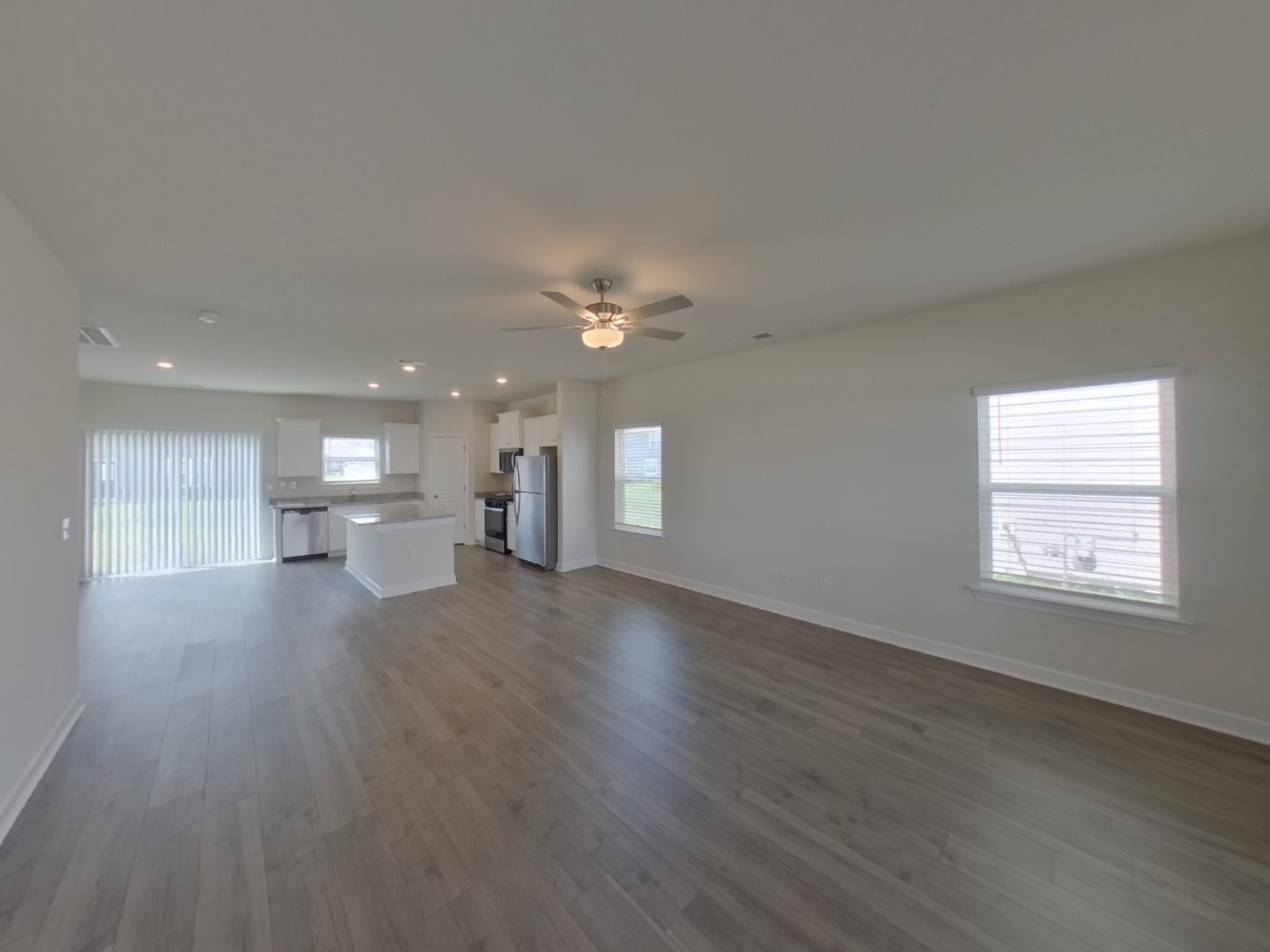 2410 Valverde Way Murfreesboro, TN 37127 - Photo 2 of 16 a view of an empty room with a kitchen