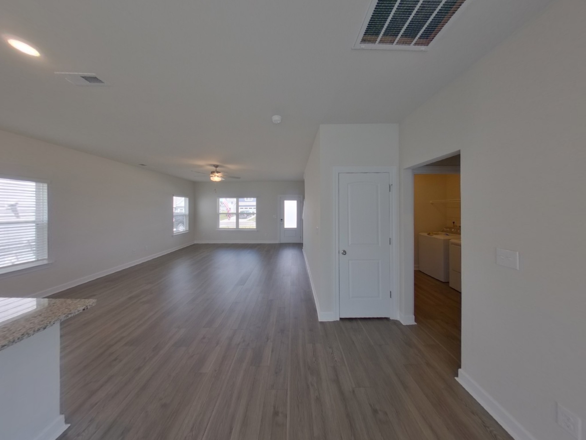 2410 Valverde Way Murfreesboro, TN 37127 - Photo 4 of 16 wooden floor in an empty room with a window