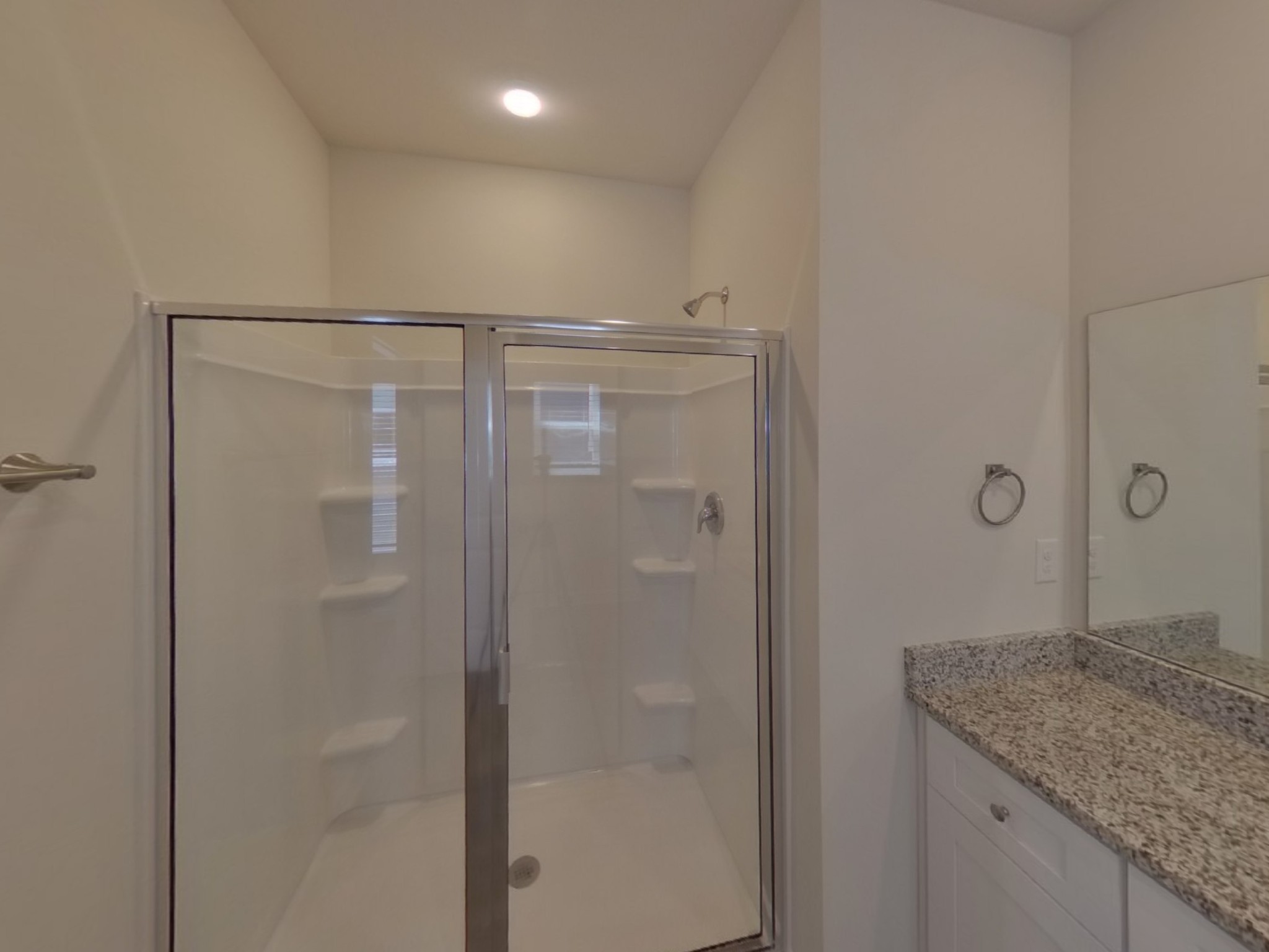 2410 Valverde Way Murfreesboro, TN 37127 - Photo 9 of 16 a bathroom with a granite countertop sink and shower