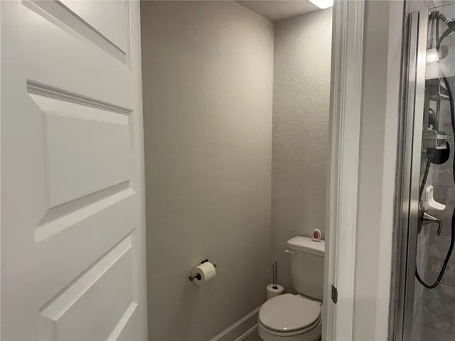 a room that has a bed and a window