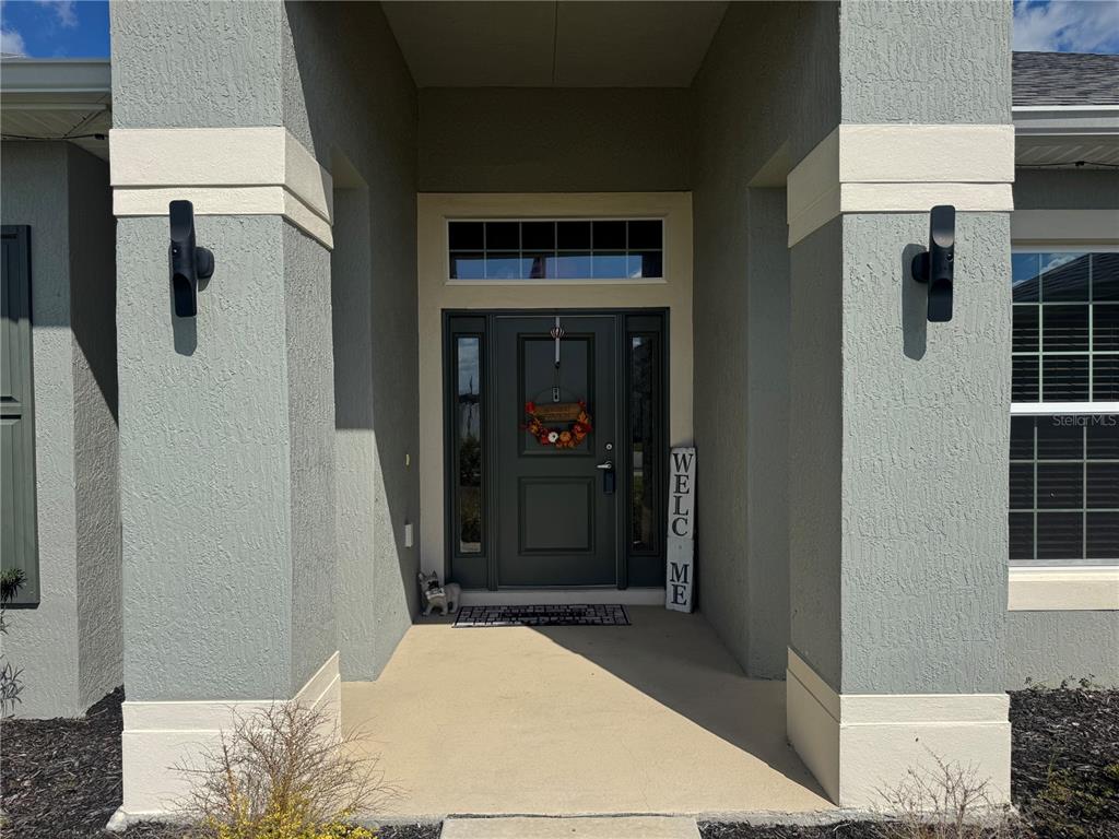 5123 Southwest 91st Street Ocala, FL 34476 - Photo 5 of 29 a bedroom with a bed and a window