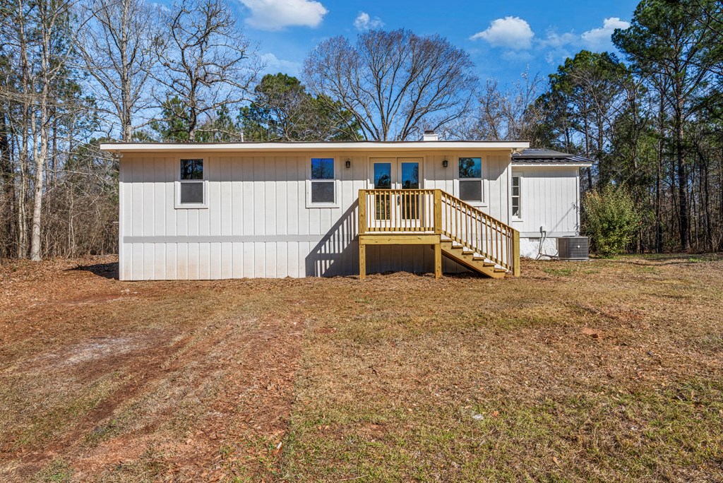 19110 Ga Highway Shiloh, GA 31826 - Photo 14 of 15 a view of house with trees in the background