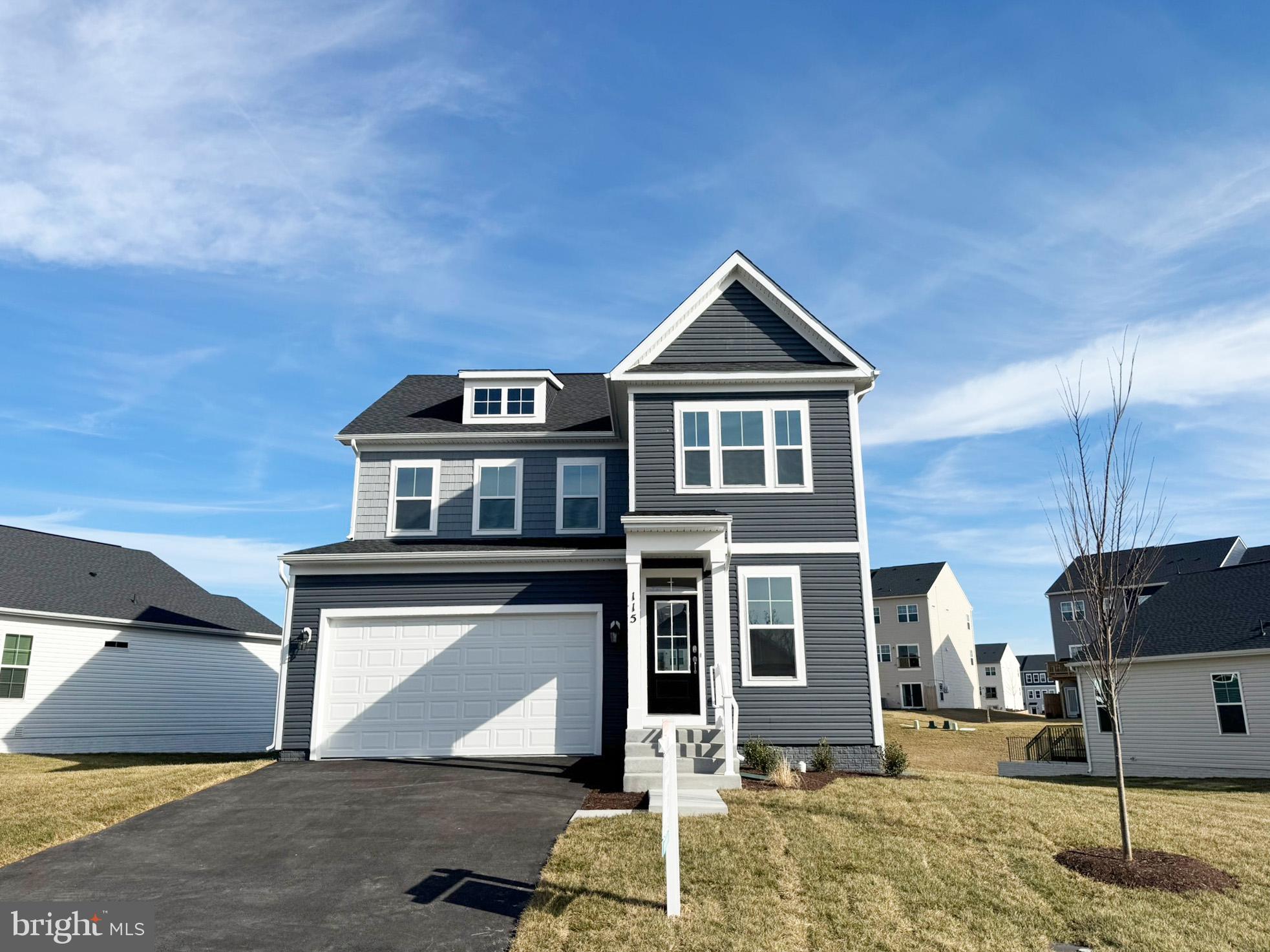 115 Sapphire Street Stephenson, VA 22656 - Photo 2 of 36 a front view of a house with parking space