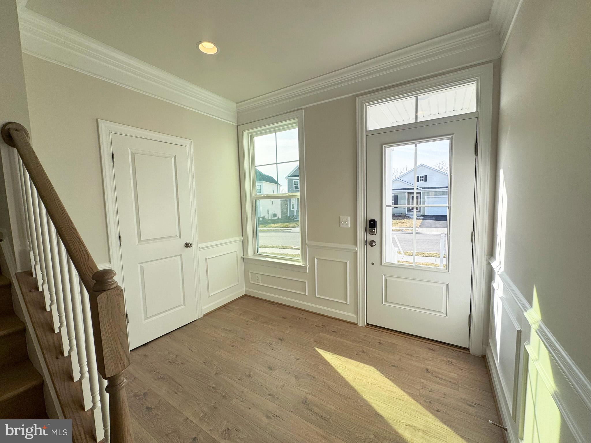 115 Sapphire Street Stephenson, VA 22656 - Photo 6 of 36 wooden floor in an empty room with a window