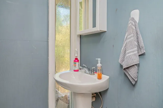 a bathroom with a sink and a toilet