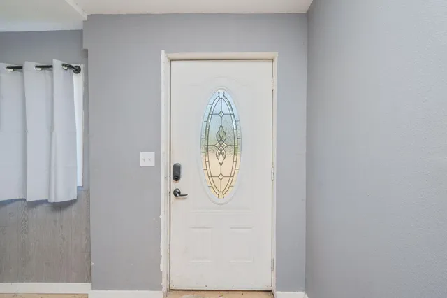 view of a hallway with elevator