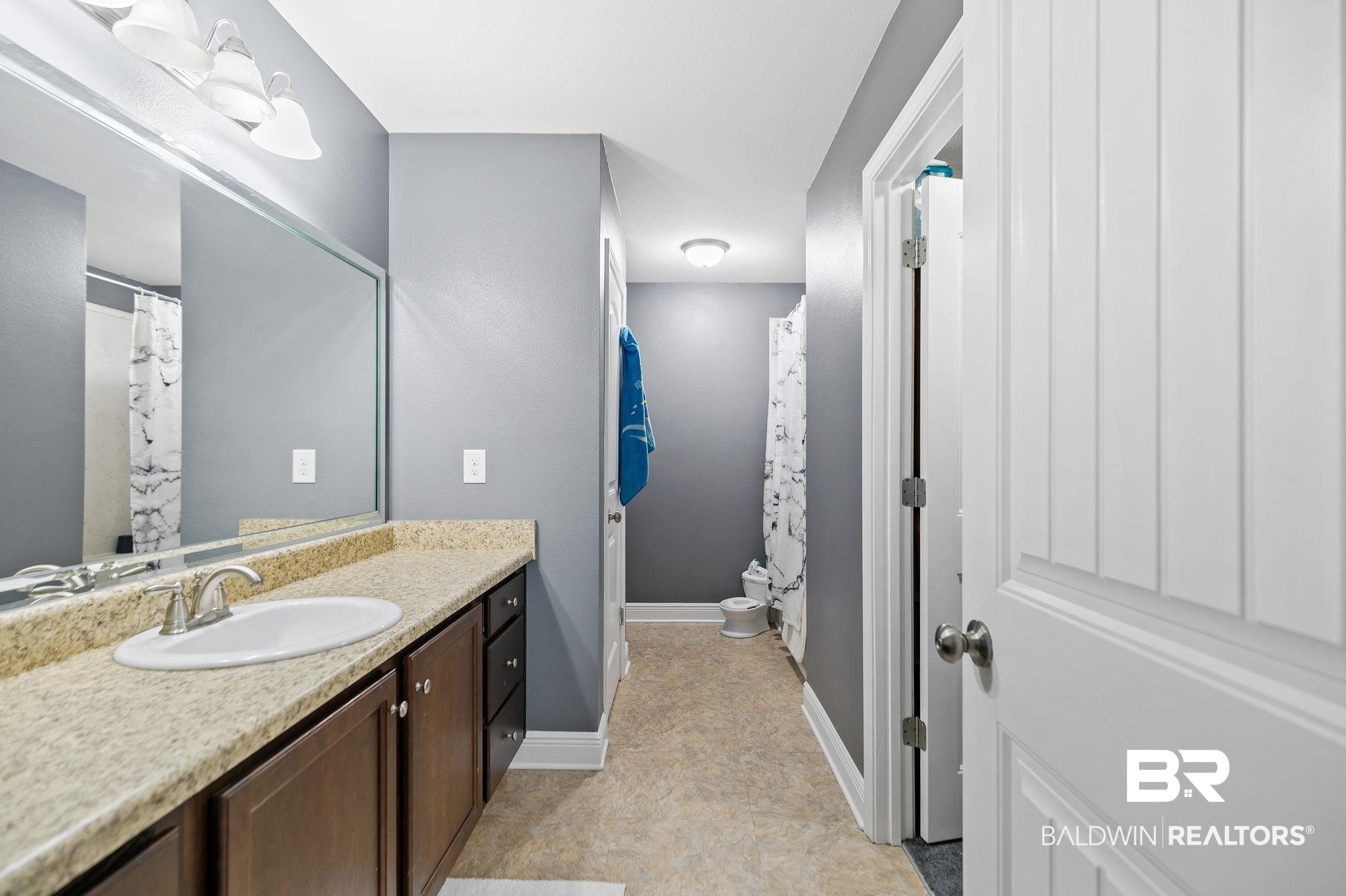 15573 Talus Court Foley, AL 36535 - Photo 25 of 50 Bathroom with vanity and tile patterned floors