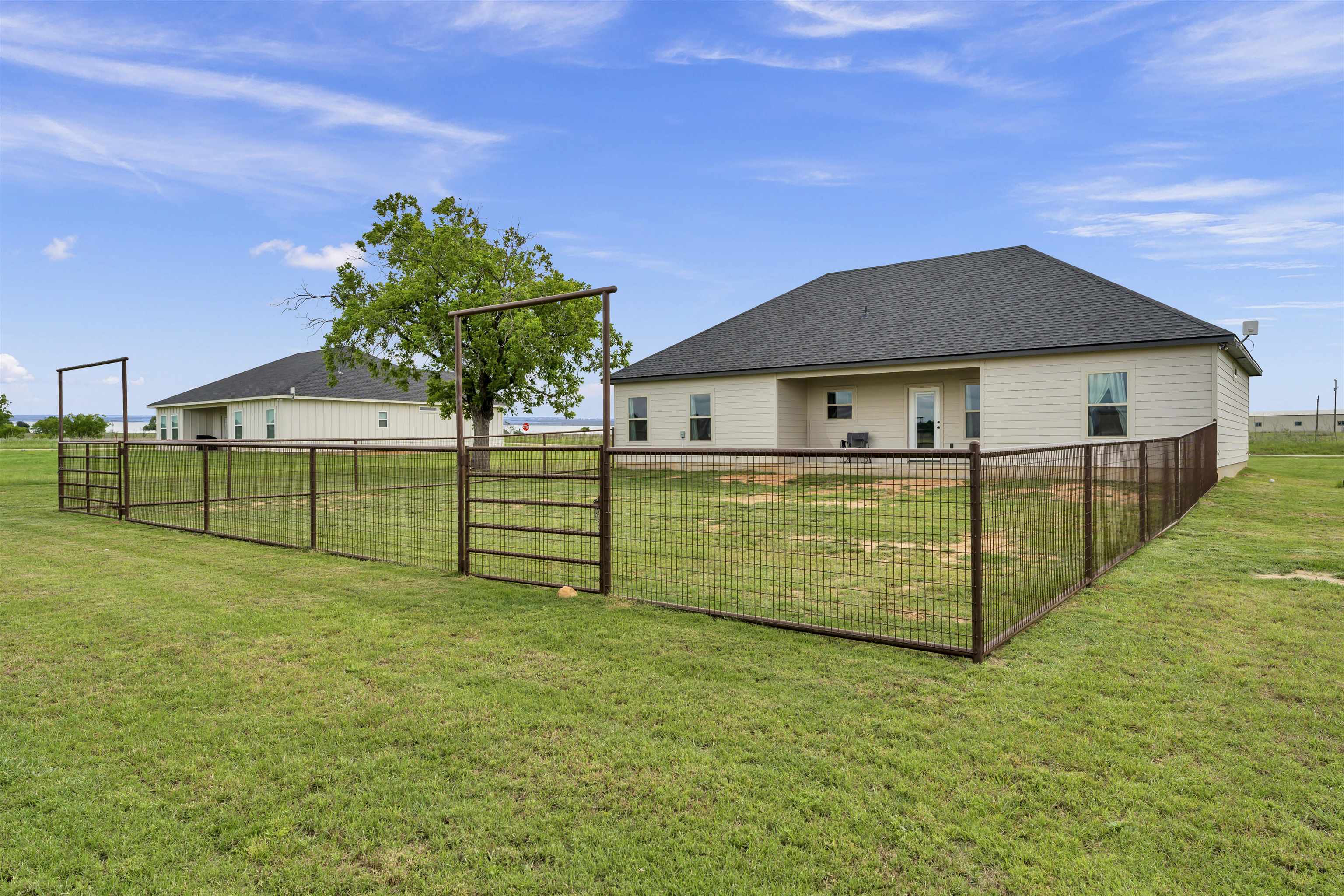 494 Johnson Road Mason, TX 76856 - Photo 23 of 28 a view of a house with a backyard