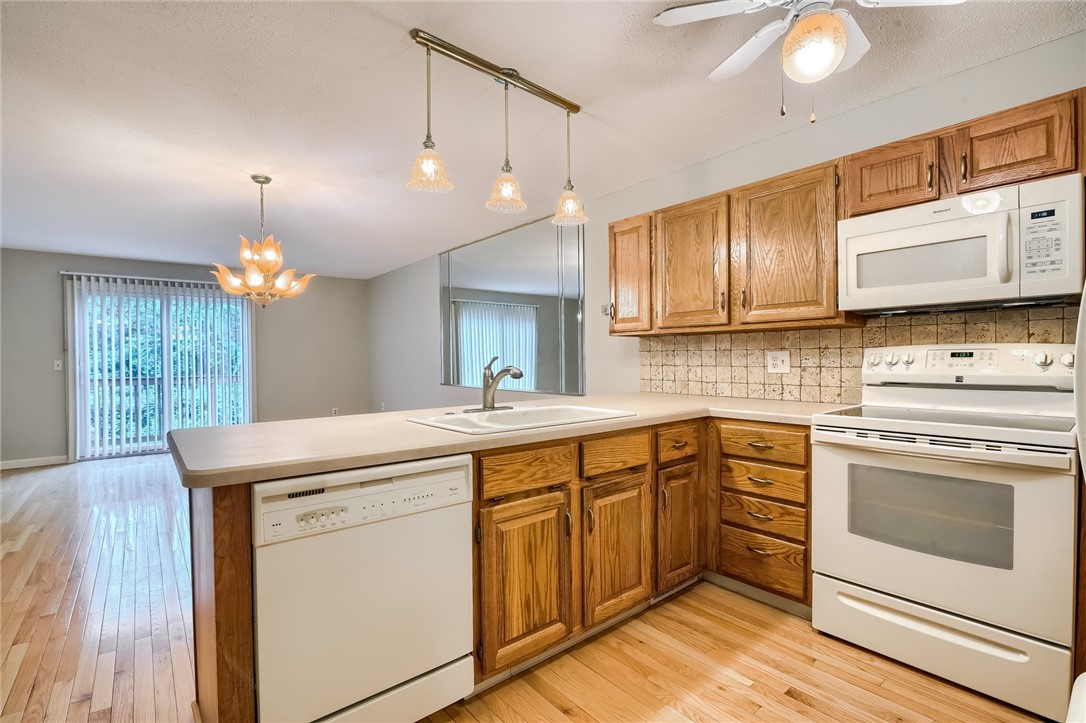 4 Smithfield Road, Unit 40 North Providence, RI 02904 - Photo 6 of 14 Kitchen open to dining and living