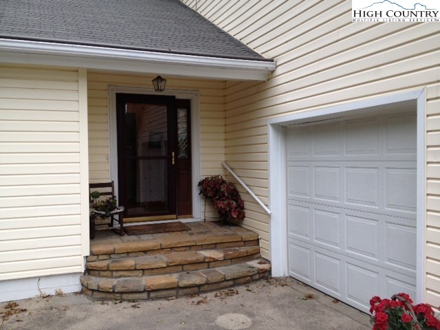 1292 Ben Miller Road Deep Gap, NC 28618 - Photo 3 of 31 a view of a entryway door of the house