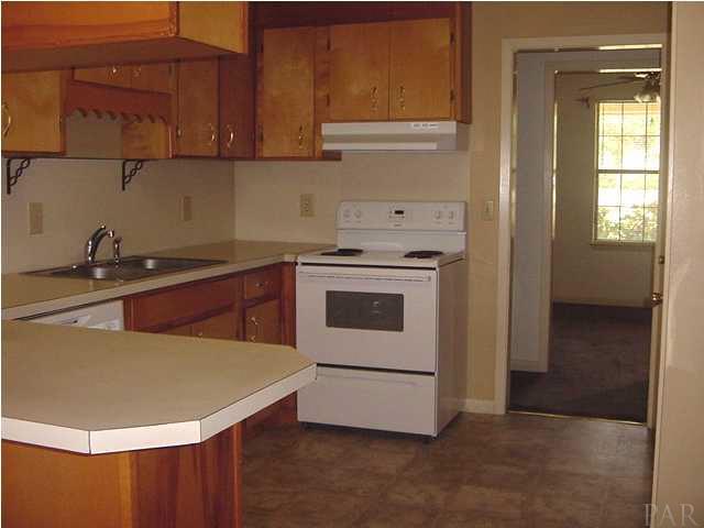 2551 Renfroe Road Pace, FL 32571 - Photo 6 of 14 Kitchen, looking toward Dining Room.