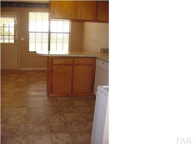 2551 Renfroe Road Pace, FL 32571 - Photo 7 of 14 Kitchen as seen from Dining Room.