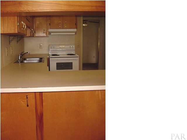 2551 Renfroe Road Pace, FL 32571 - Photo 8 of 14 Kitchen with pass-thru as seen from Breakfast Nook.