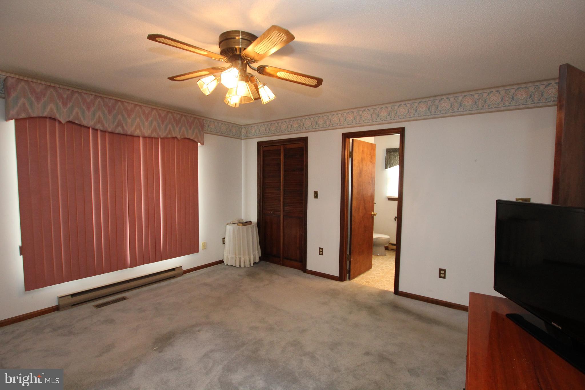 11429 Taylor Mill Road Laurel, DE 19956 - Photo 12 of 20 Master Bedroom with Walk in Closet