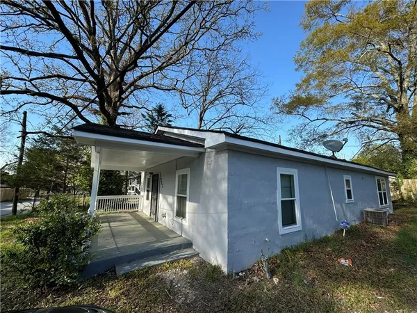 a view of a house with a patio