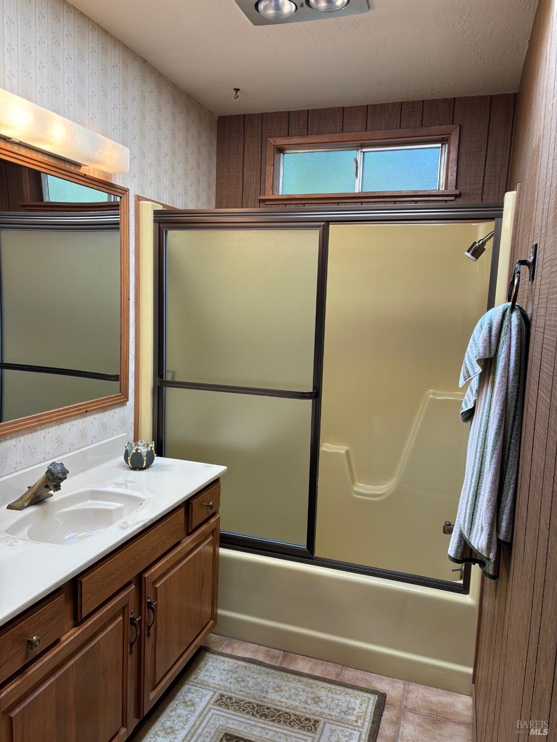 3680 Calistoga Road Santa Rosa, CA 95404 - Photo 12 of 32 a bathroom with a sink and a mirror
