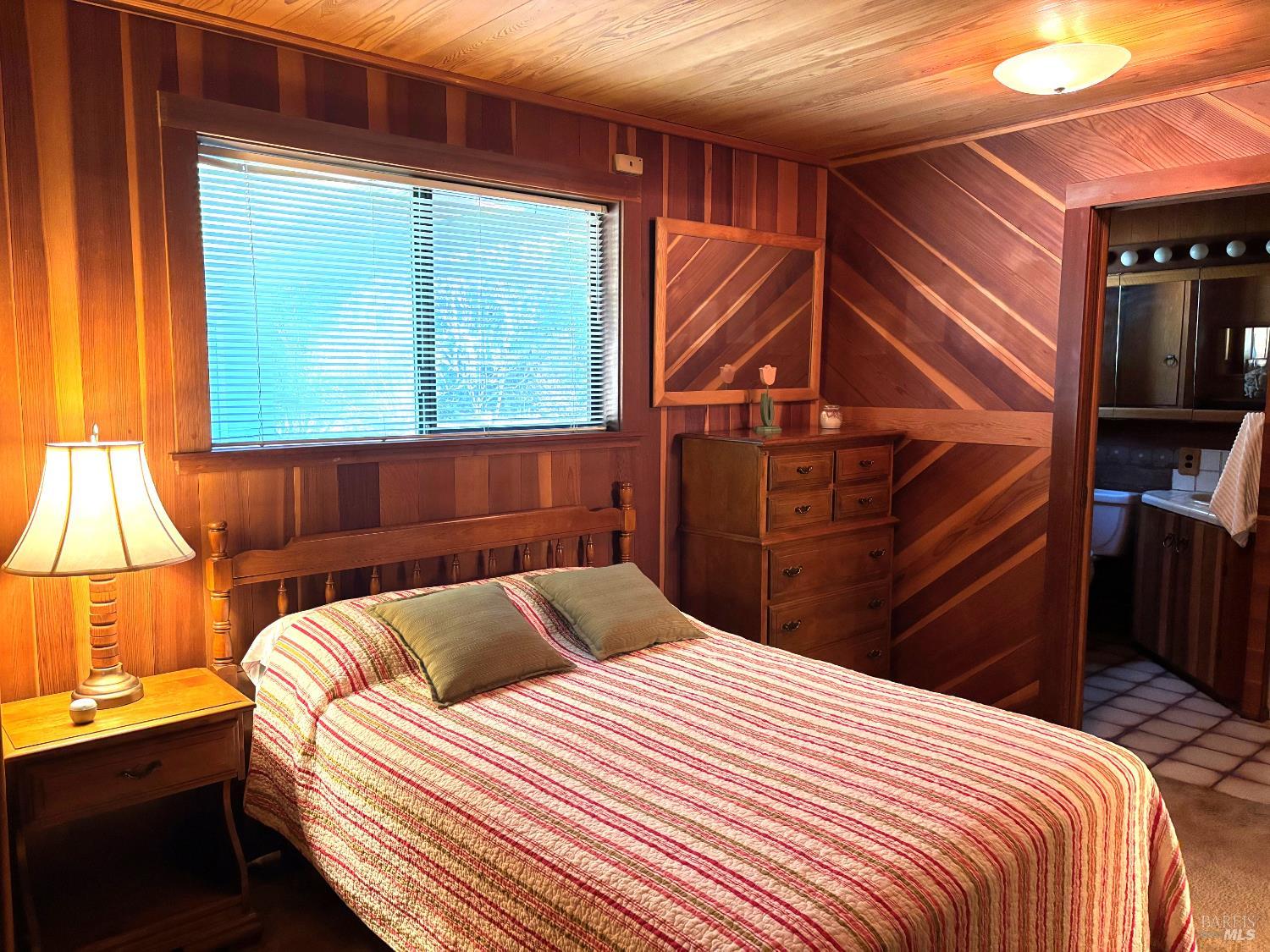 3680 Calistoga Road Santa Rosa, CA 95404 - Photo 14 of 32 a bedroom with a bed and a window