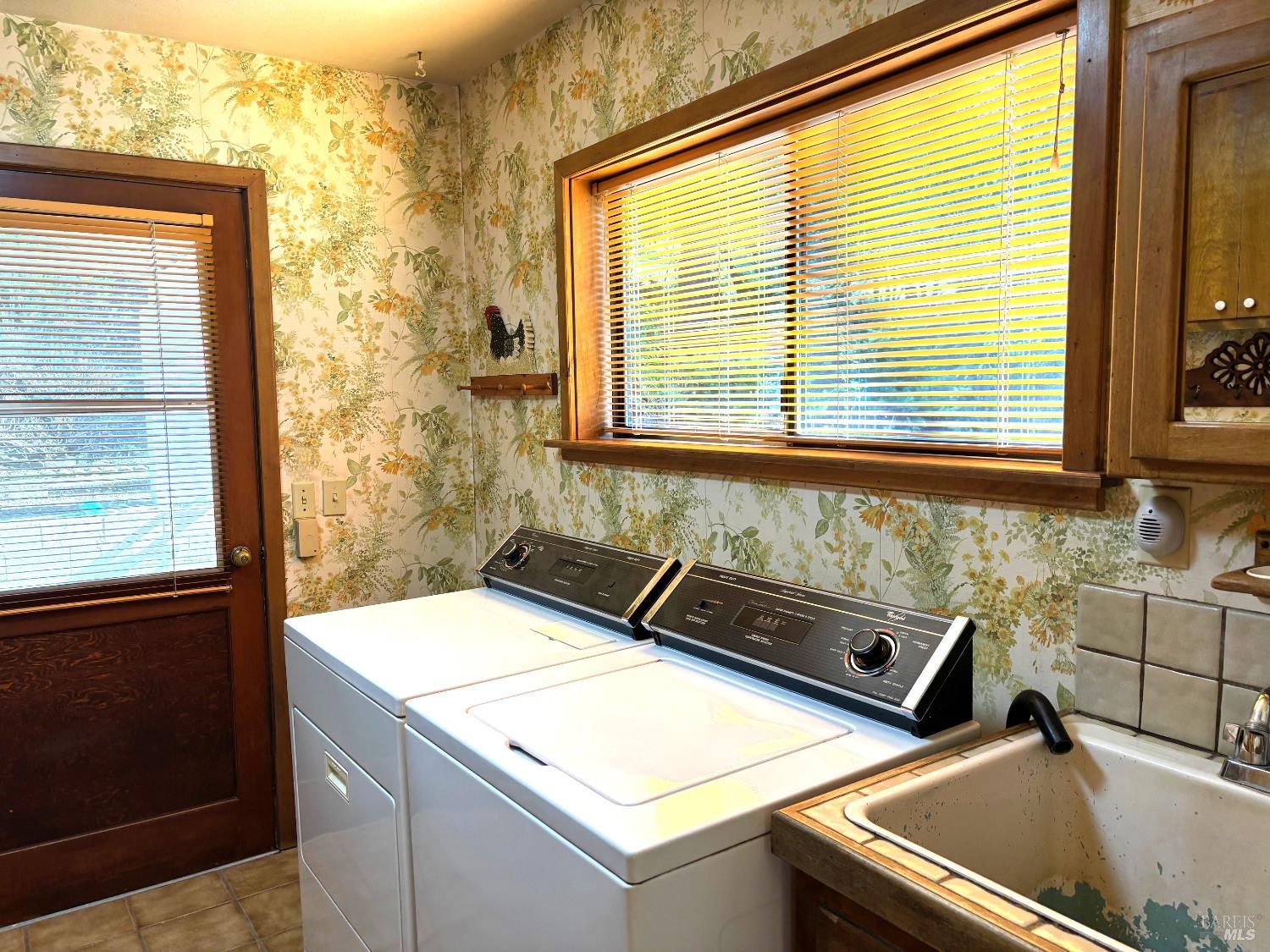 3680 Calistoga Road Santa Rosa, CA 95404 - Photo 17 of 32 a kitchen that has a sink and a stove