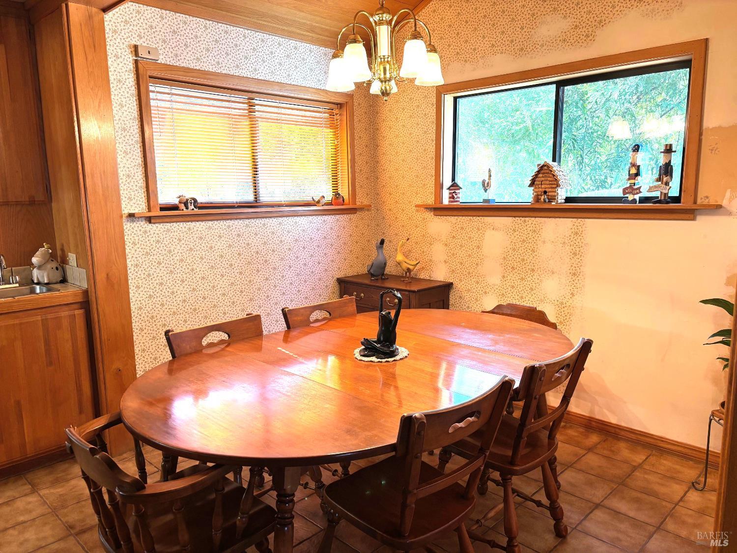 3680 Calistoga Road Santa Rosa, CA 95404 - Photo 8 of 32 a dining room with furniture and window