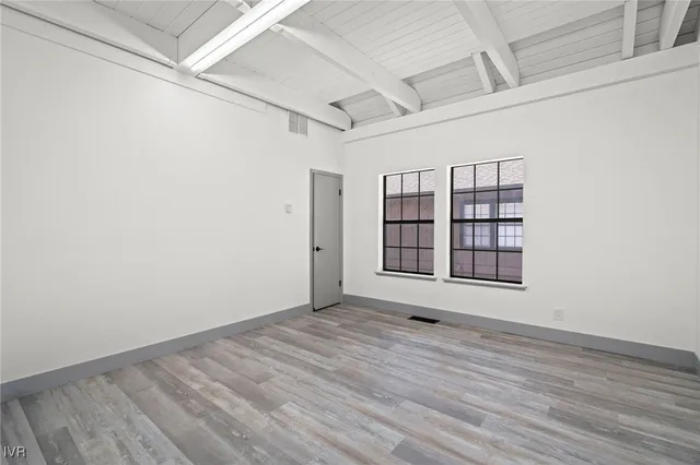 an empty room with windows