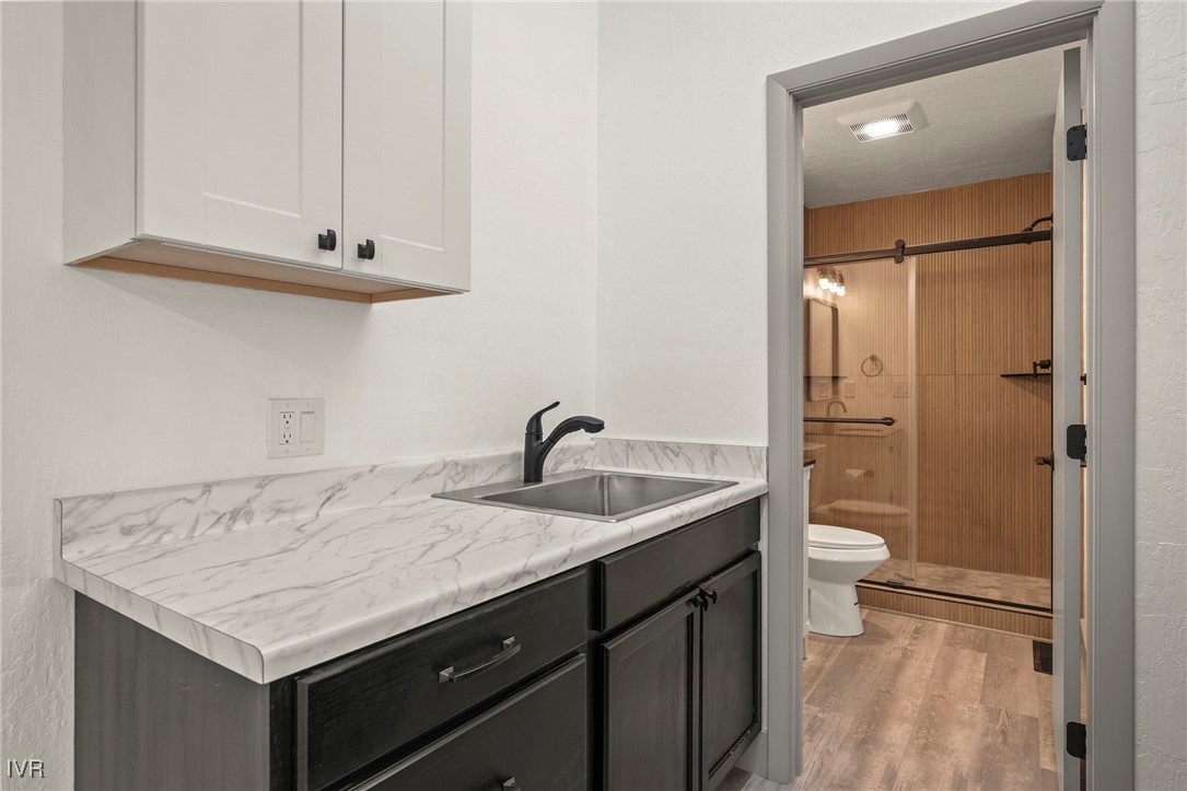 924 Incline Way, Unit N Incline Village, NV 89451 - Photo 12 of 19 a bathroom with a sink and a toilet