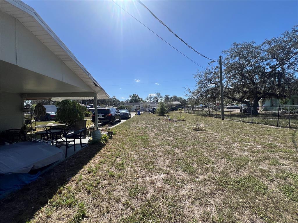 6006 Vel Street Wimauma, FL 33598 - Photo 15 of 17 a view of outdoor space with seating area