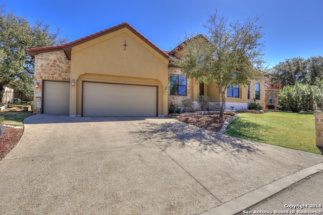29114 Tivoli Way Boerne, TX 78015 - Photo 31 of 31 a front view of a house with a yard and garage