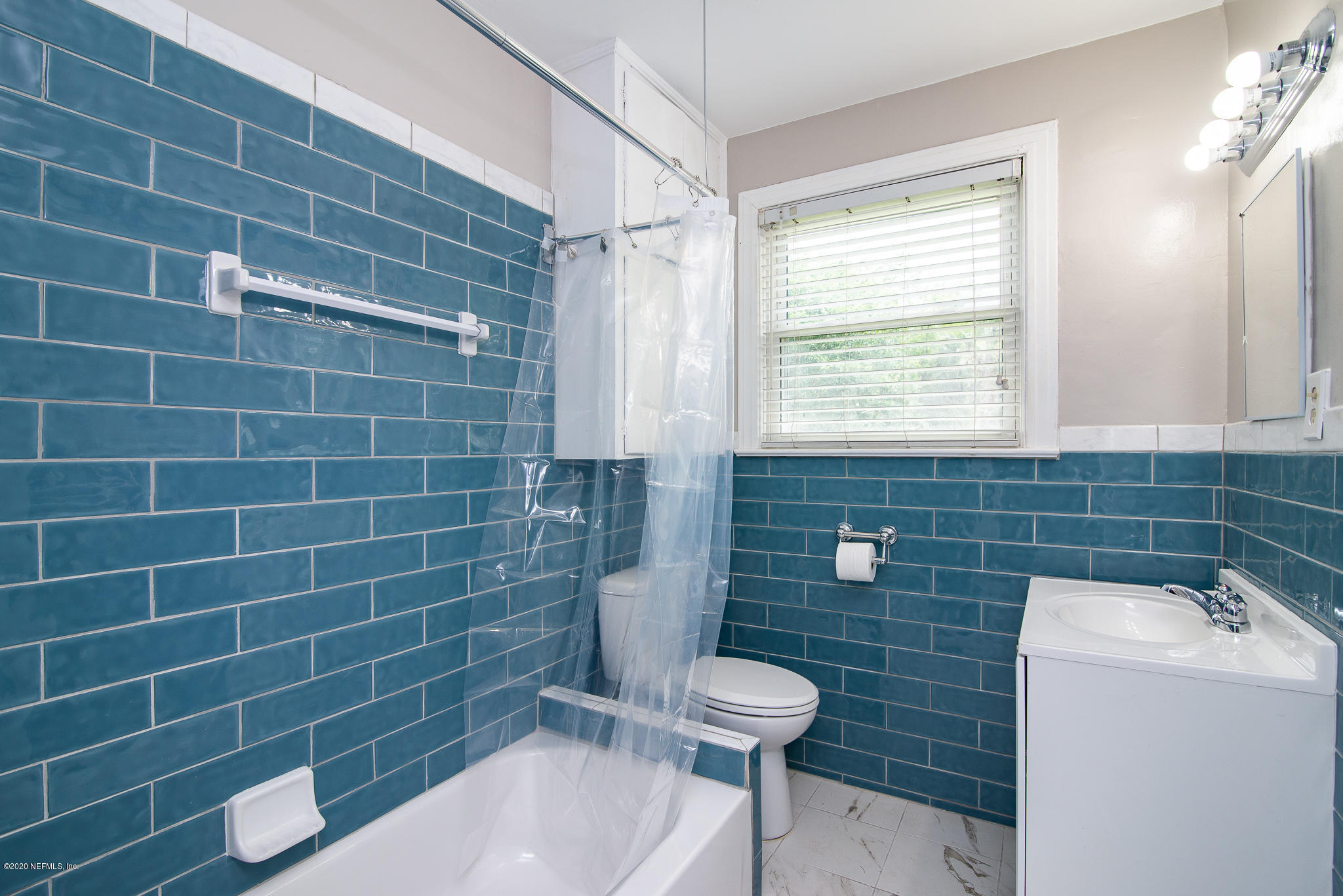 2335 Parental Home Road Jacksonville, FL 32216 - Photo 30 of 39 remodeled bathroom