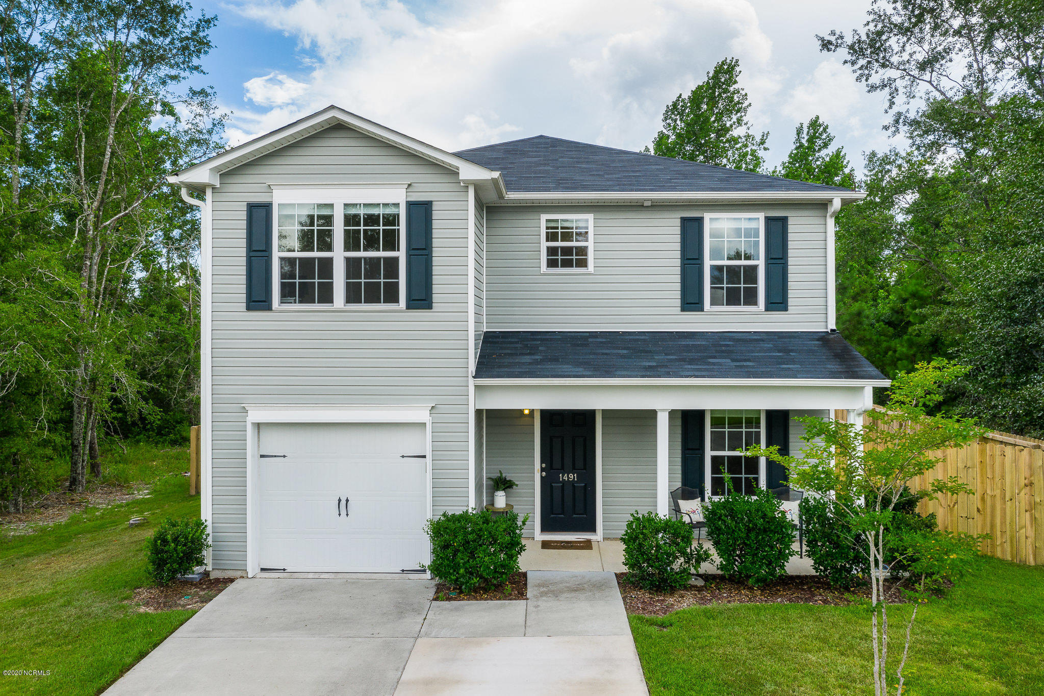 1491 Gate Hill Road Southeast Bolivia, NC 28422 - Photo 1 of 34 Front