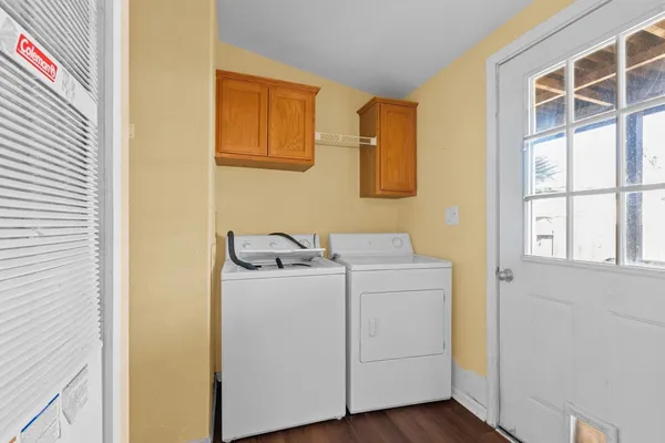 a utility room with dryer and washer