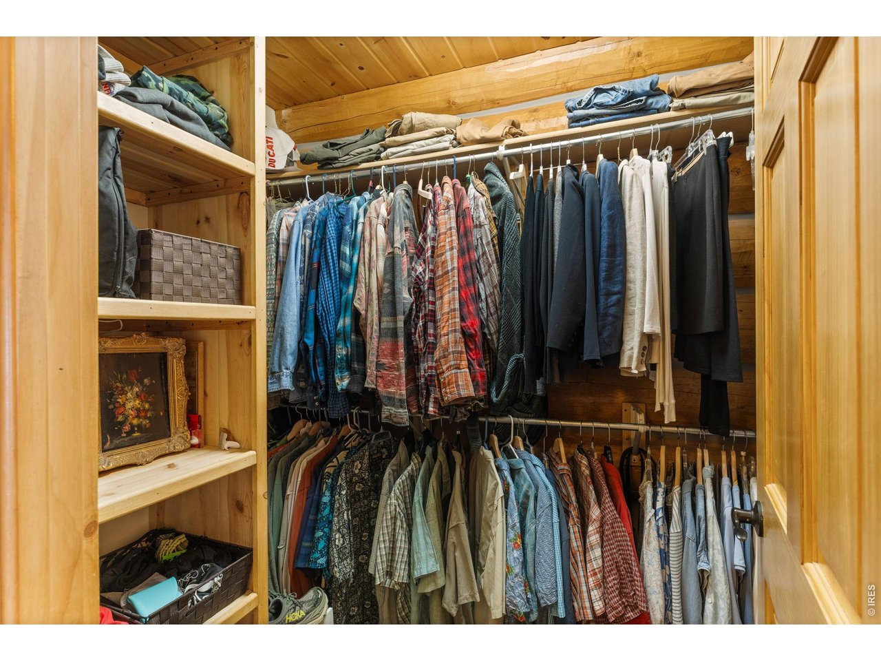470 Big John Road Lyons, CO 80540 - Photo 20 of 44 a view of walk in closet with clothes and shoes