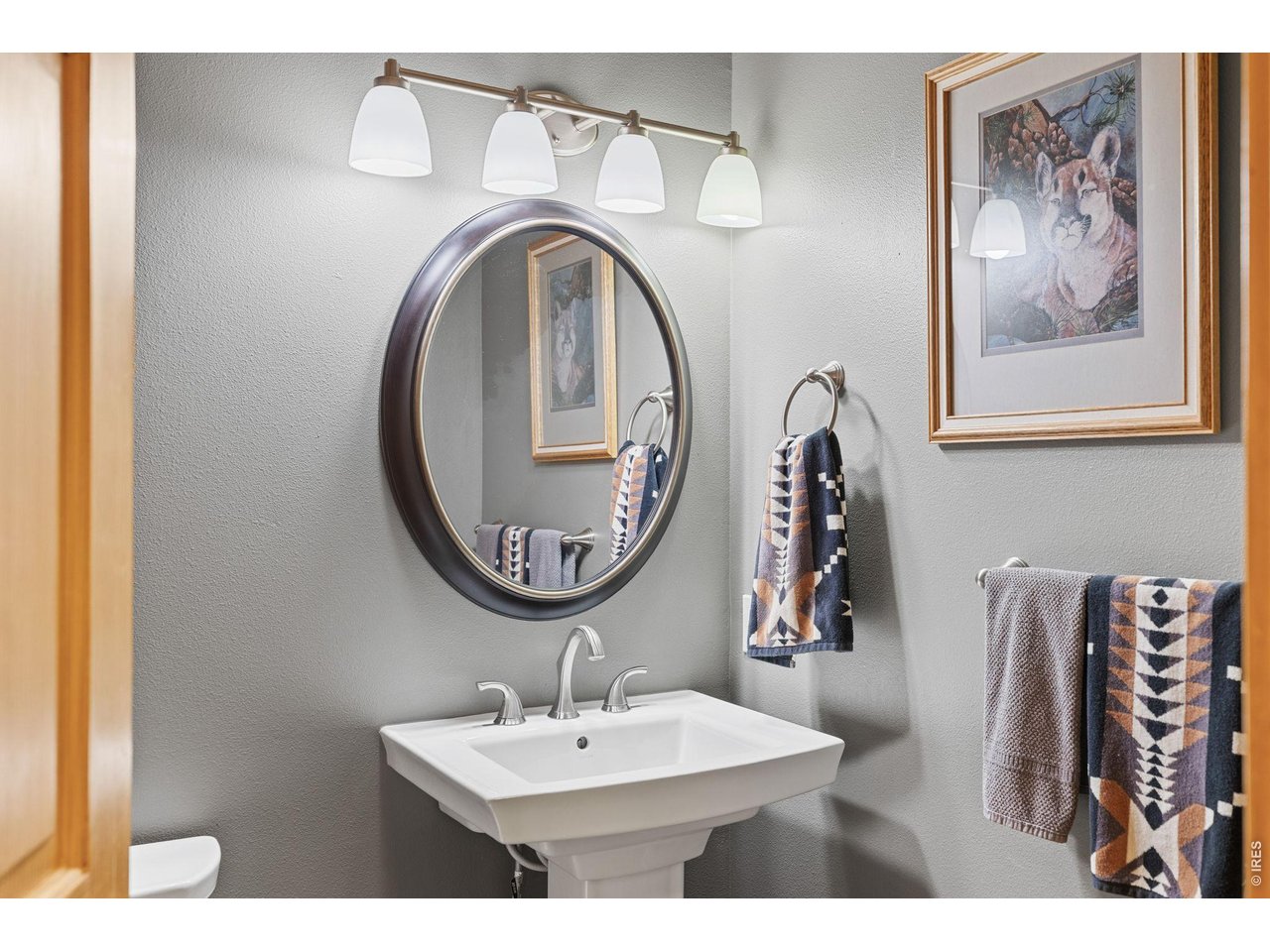 470 Big John Road Lyons, CO 80540 - Photo 25 of 44 a bathroom with a sink and a mirror