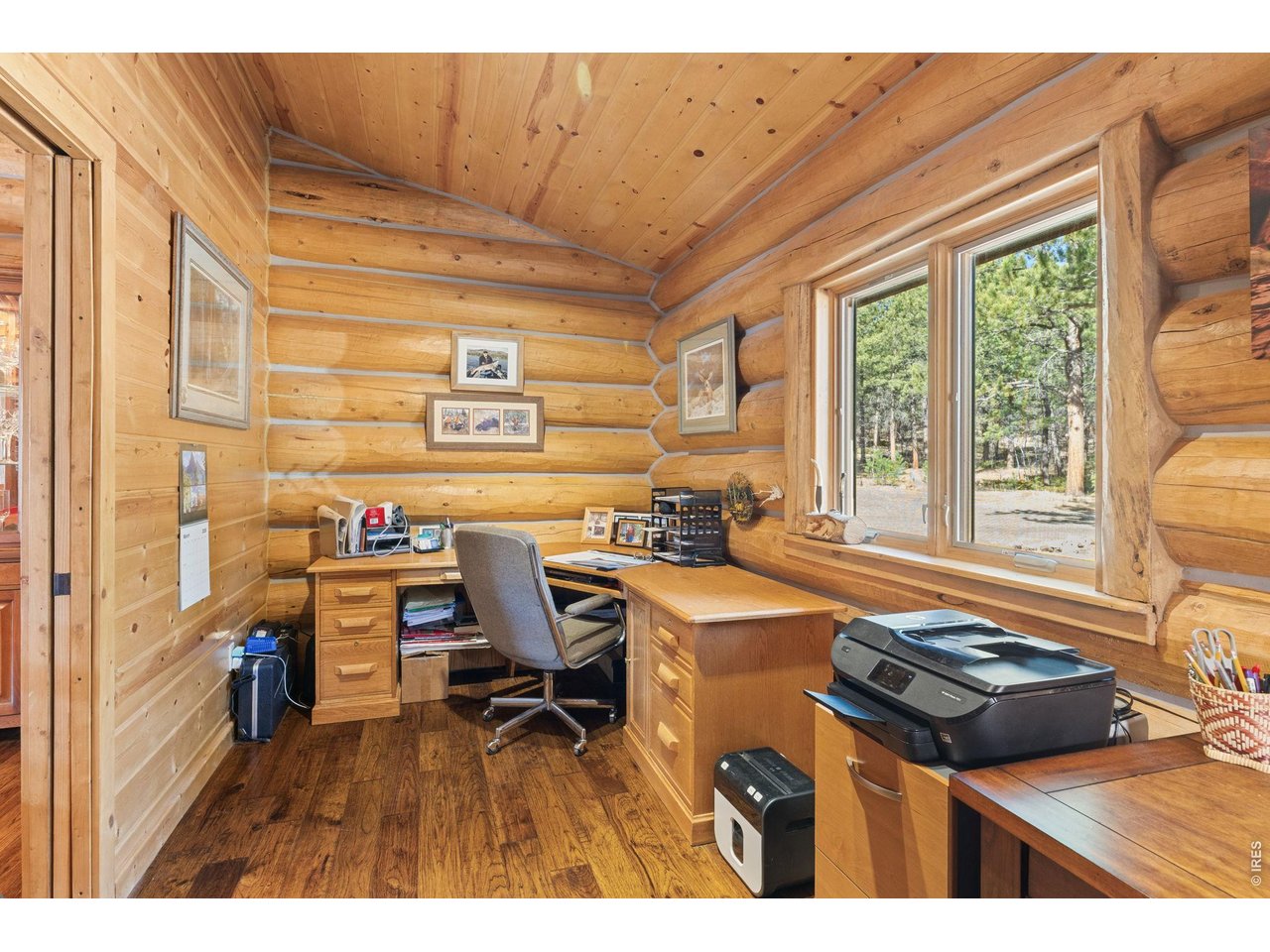 470 Big John Road Lyons, CO 80540 - Photo 26 of 44 a kitchen with a stove a refrigerator and a dining table