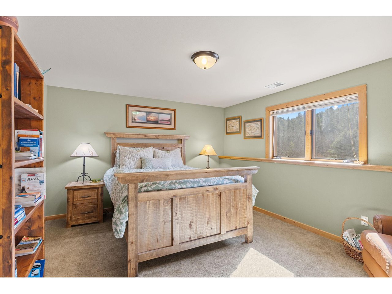 470 Big John Road Lyons, CO 80540 - Photo 27 of 44 a bedroom with a bed and a window