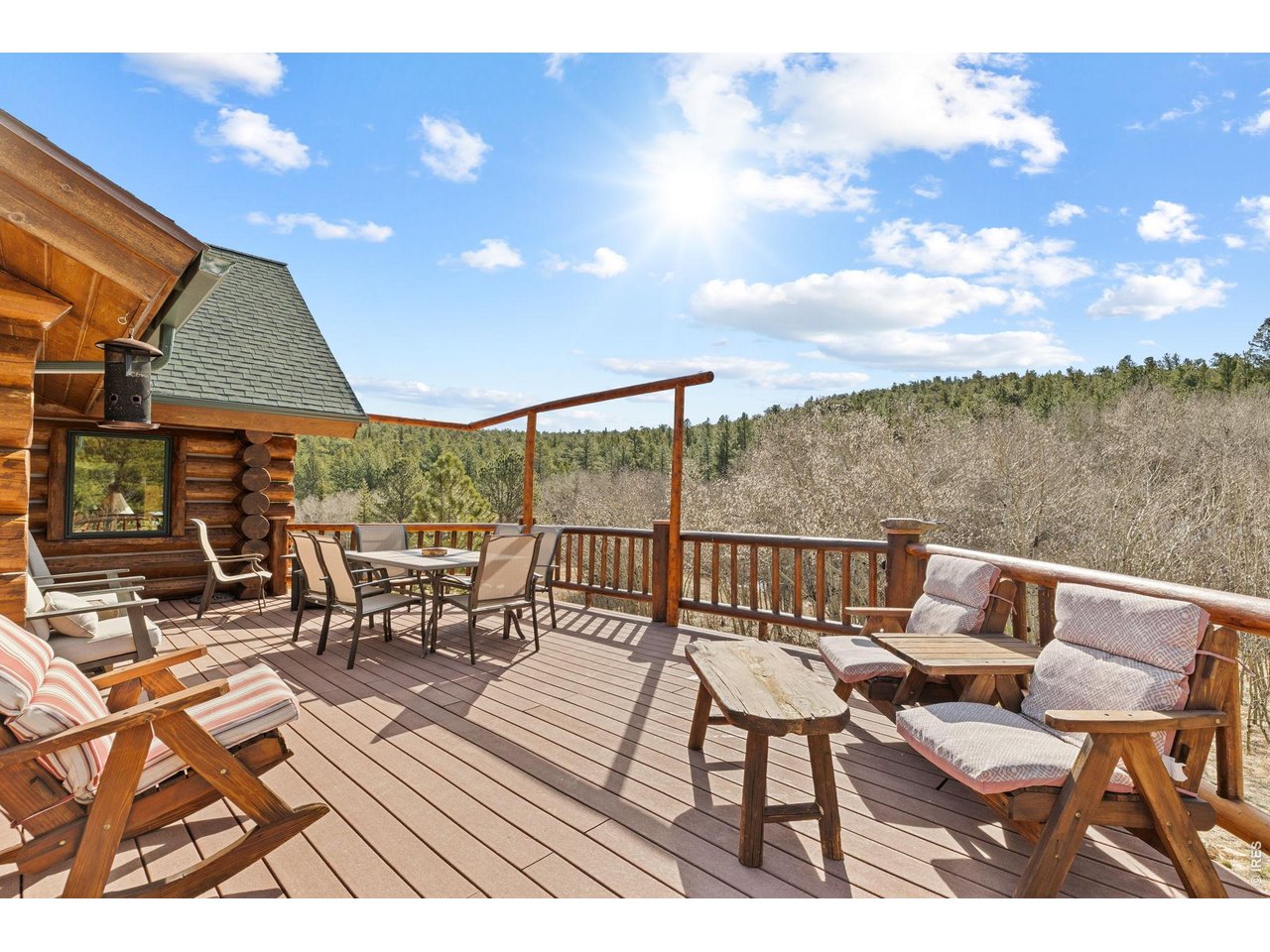 470 Big John Road Lyons, CO 80540 - Photo 29 of 44 a view of a chairs and table in the patio
