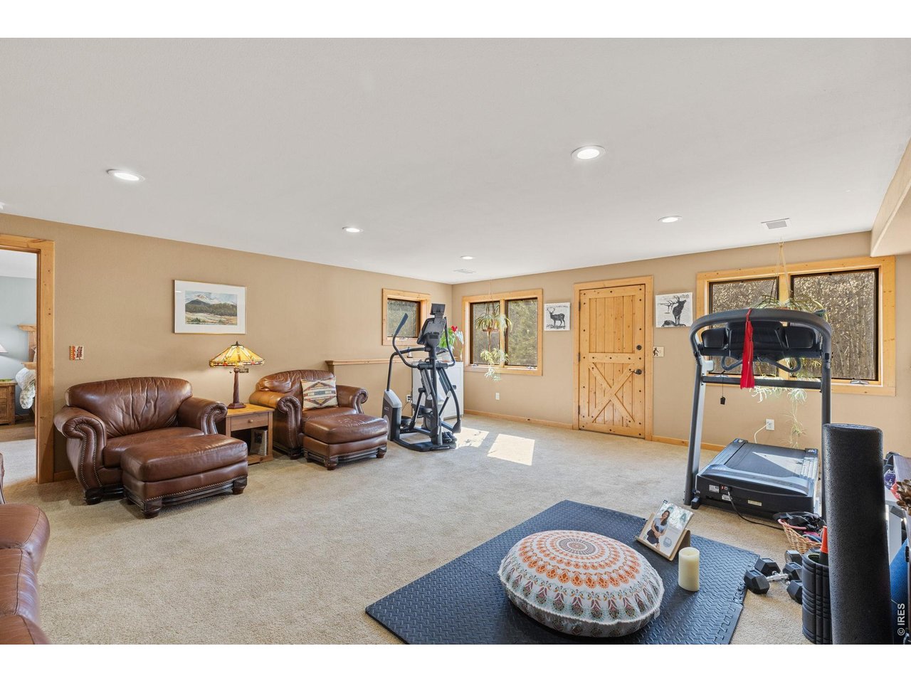 470 Big John Road Lyons, CO 80540 - Photo 34 of 44 a living room with furniture a air conditioner and a window