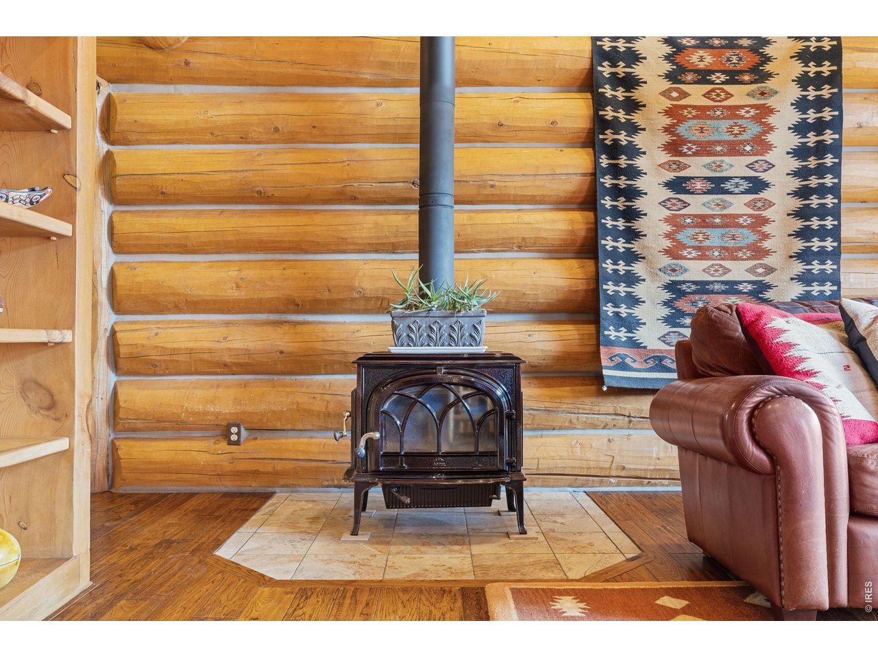 470 Big John Road Lyons, CO 80540 - Photo 9 of 44 a living room with furniture a rug and a window