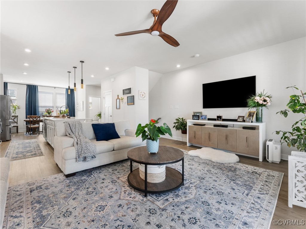 14100 Millpointe Road Midlothian, VA 23114 - Photo 11 of 46 a living room with furniture and a flat screen tv