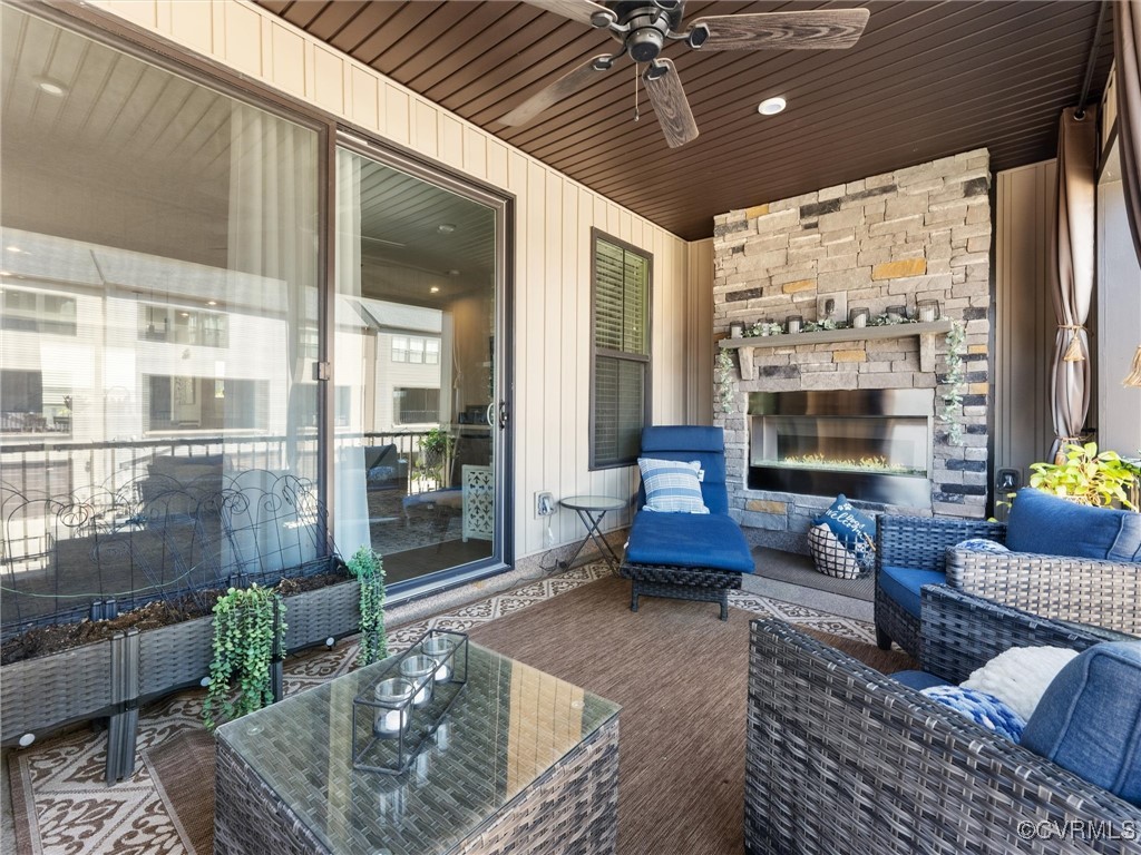 14100 Millpointe Road Midlothian, VA 23114 - Photo 12 of 46 a living room with furniture and a large window