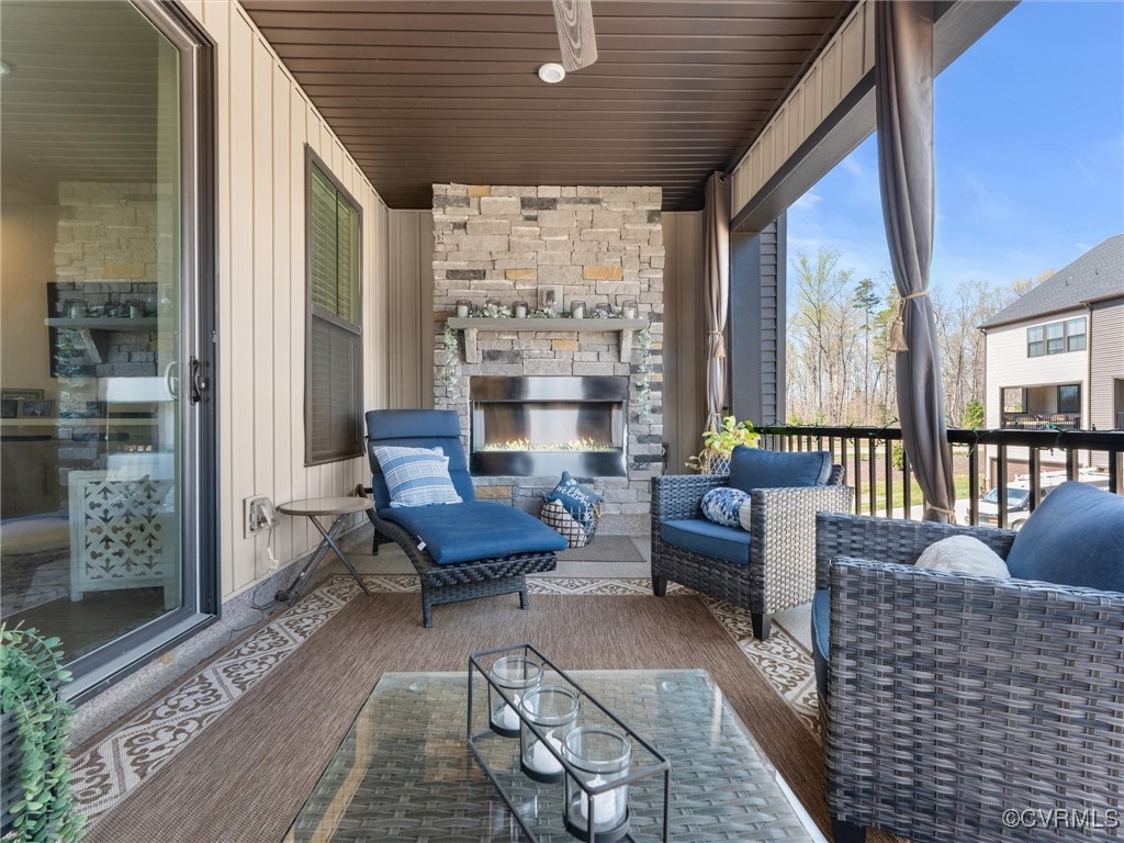 14100 Millpointe Road Midlothian, VA 23114 - Photo 13 of 46 a outdoor living space with patio furniture and a fireplace