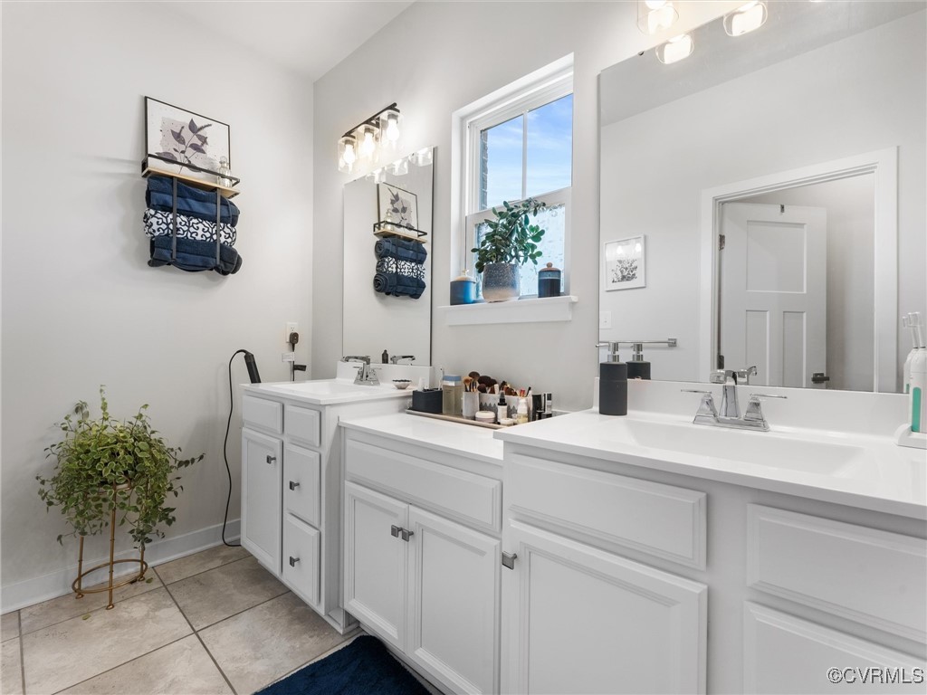14100 Millpointe Road Midlothian, VA 23114 - Photo 28 of 46 a bathroom with a double vanity sink mirror and