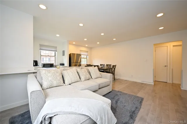 a living room with furniture and a couch