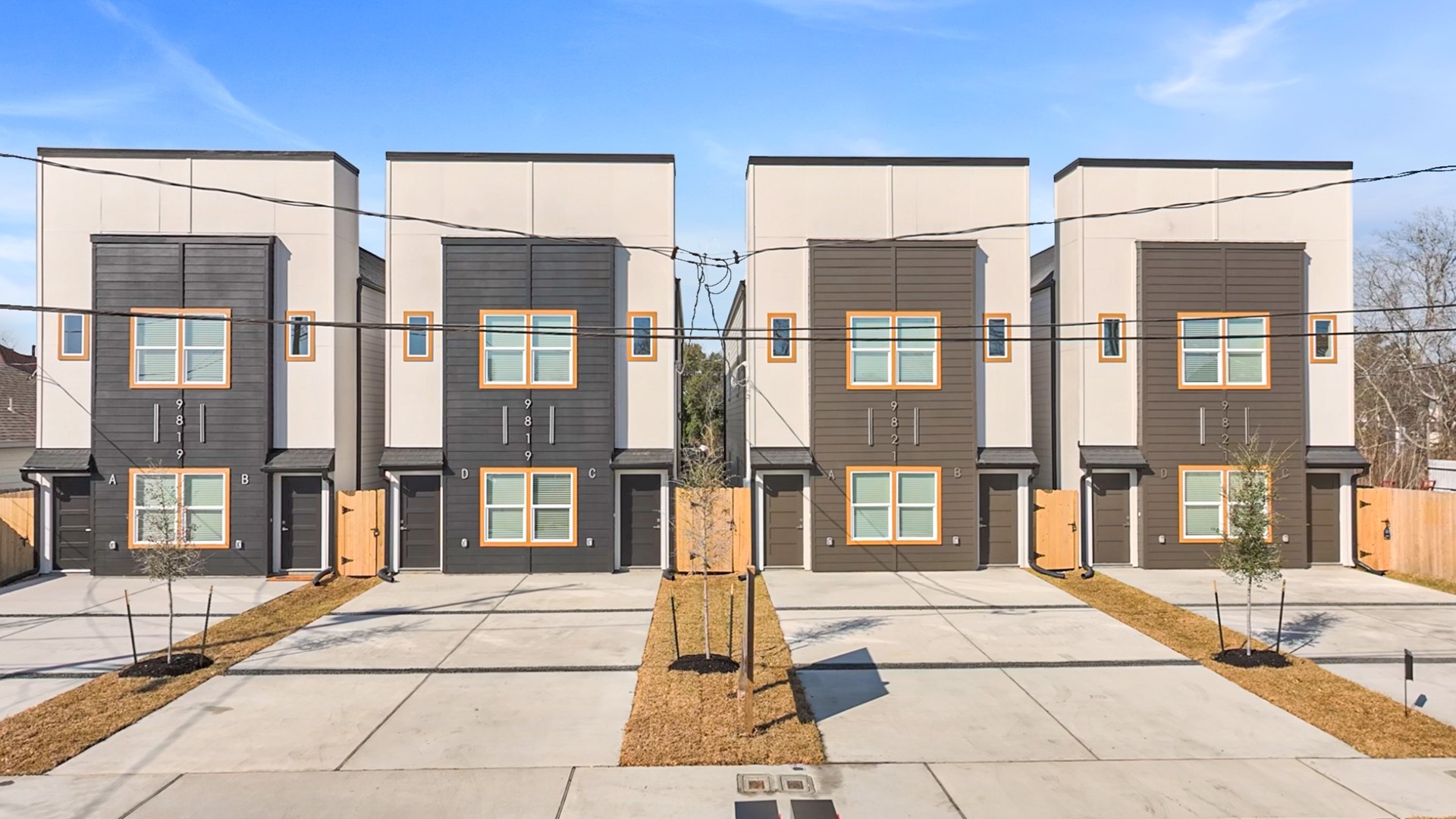 9819 Turnbow Street, Unit CD Houston, TX 77029 - Photo 1 of 32 a view of a brick building with a bench