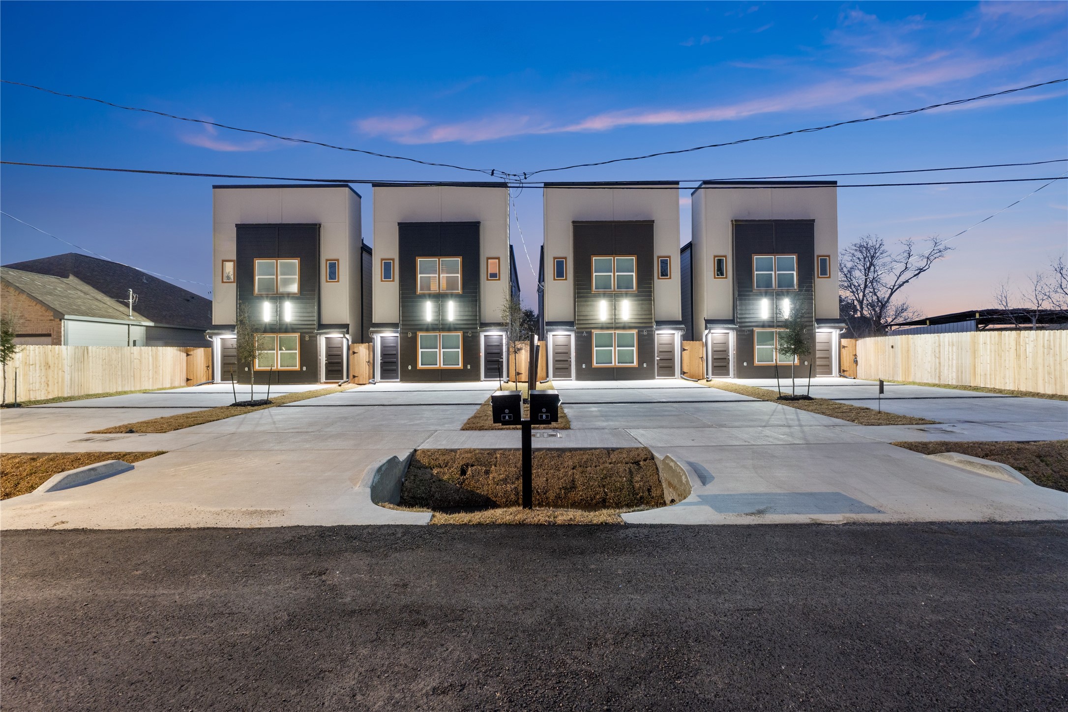9819 Turnbow Street, Unit CD Houston, TX 77029 - Photo 31 of 32 a front view of a building with garage