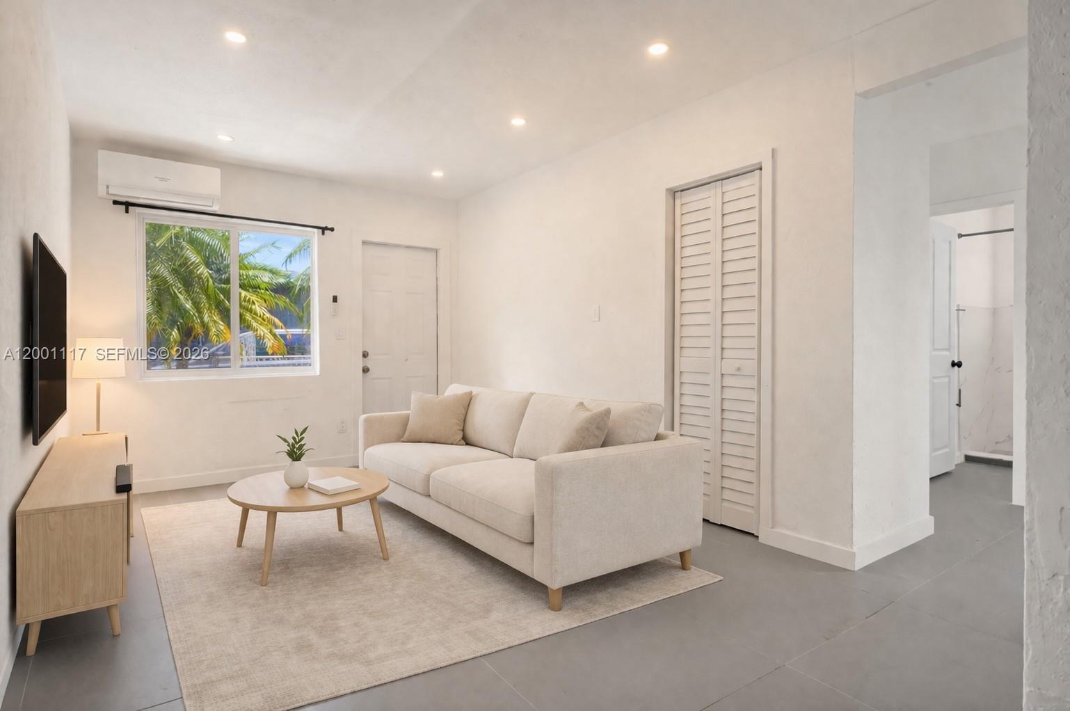 11775 Southwest 223rd Street Miami, FL 33170 - Photo 27 of 42 a living room with furniture and a window