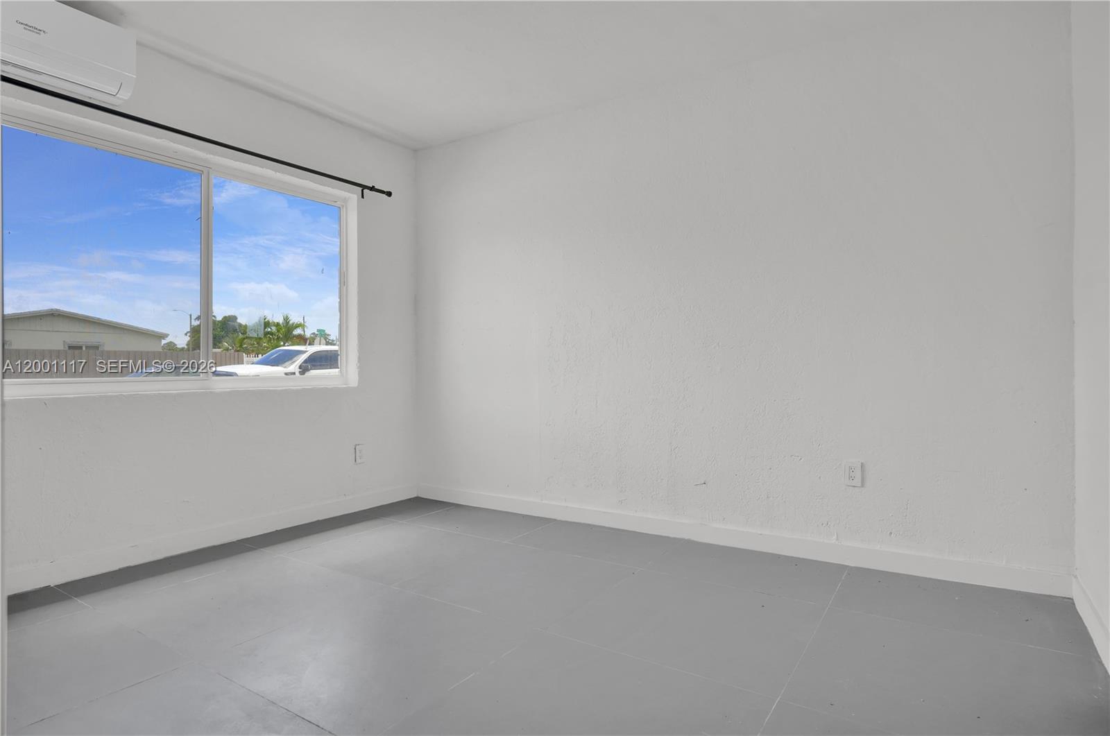 11775 Southwest 223rd Street Miami, FL 33170 - Photo 31 of 42 a view of an empty room with a window